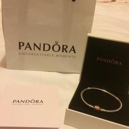 Never worn 18cm Pandora bracelet, Silver with Rose Gold clasp, beautiful bracelet bought it on a mad impulse.