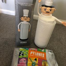 This chef kitchen roll holder is brand new and never been used. It is from pylones in york. The chef has movable arms to hold the kitchen roll in place