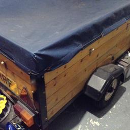 Wooden car trailer. 3 x5 ft. 
Electric hook up.