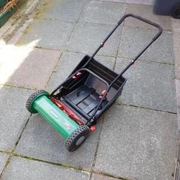 Push mower with collection bin.
Adjustable cutting height.
Just needs a good brush down and a few squirts of oil