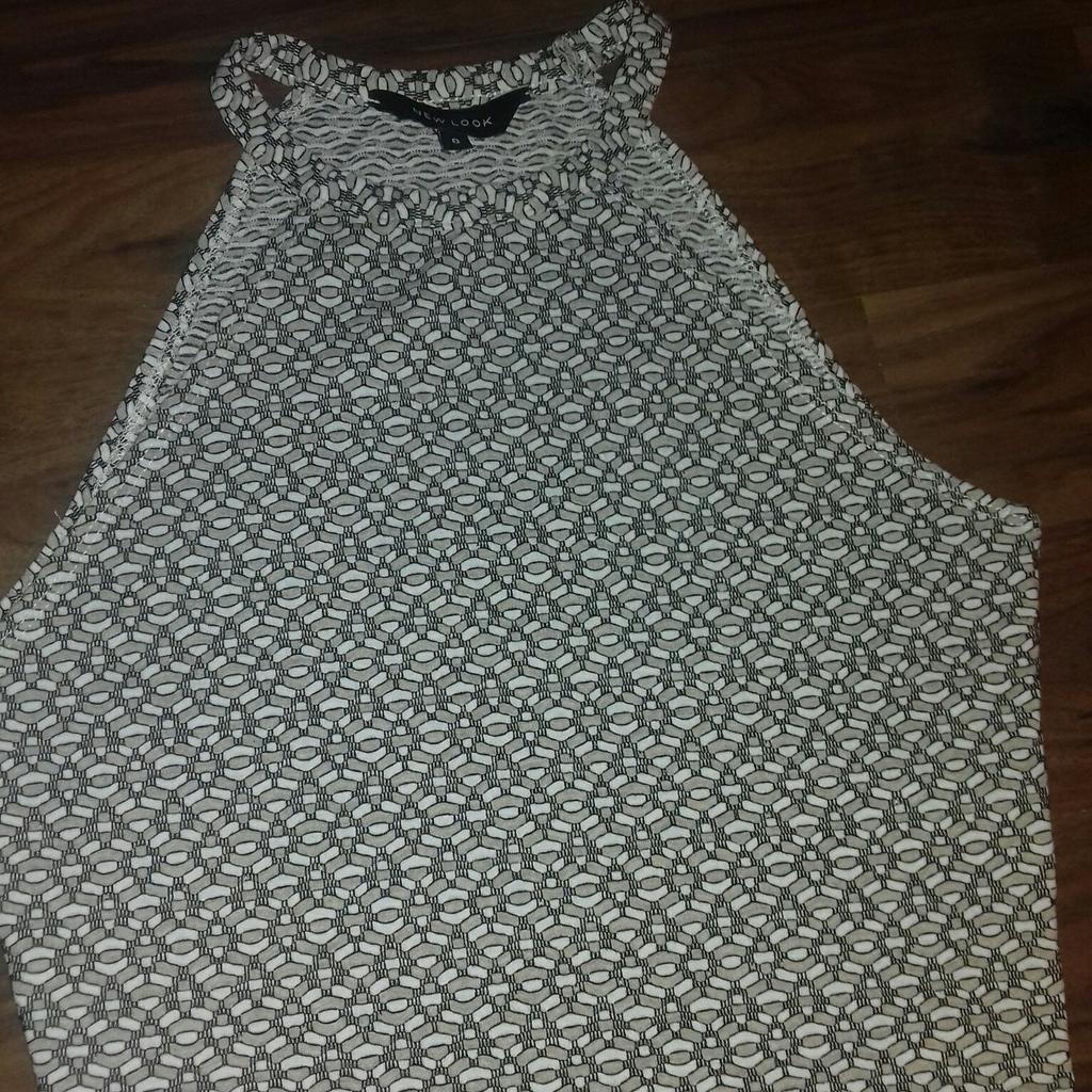 Ladies alter neck New Look top size 8 only worn a couple of times £2. collect only.