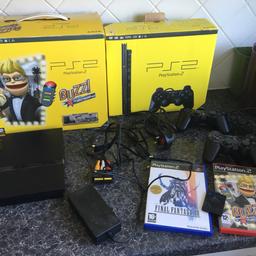 Comes with what you see in pic. Instruction manuals are still sealed and the ps2 has protective wrapping on the console still. Basically mint condition. Comes with buzz game and controllers which are still basically sealed and unused. Boxes are not mint but still very good.