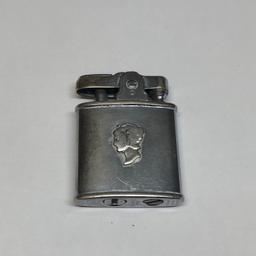 Art Deco Ronson Princess lighter. It has a Sterling silver Cameo which is factory attached To the lighter. That is quite a eye catcher.