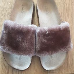 Fluffy sliders size 5/6 from m&co only worn twice. Good condition sold as seen buyer to collect amd no returns. 5.00