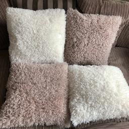 Only bought last week but decided on a colour change. 
2 cream and 2 taupe / fawn washable covers and cushion pads. 
Very soft and fluffy