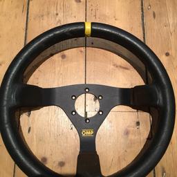 Leather OMP steering wheel with general wear and slight discolouration