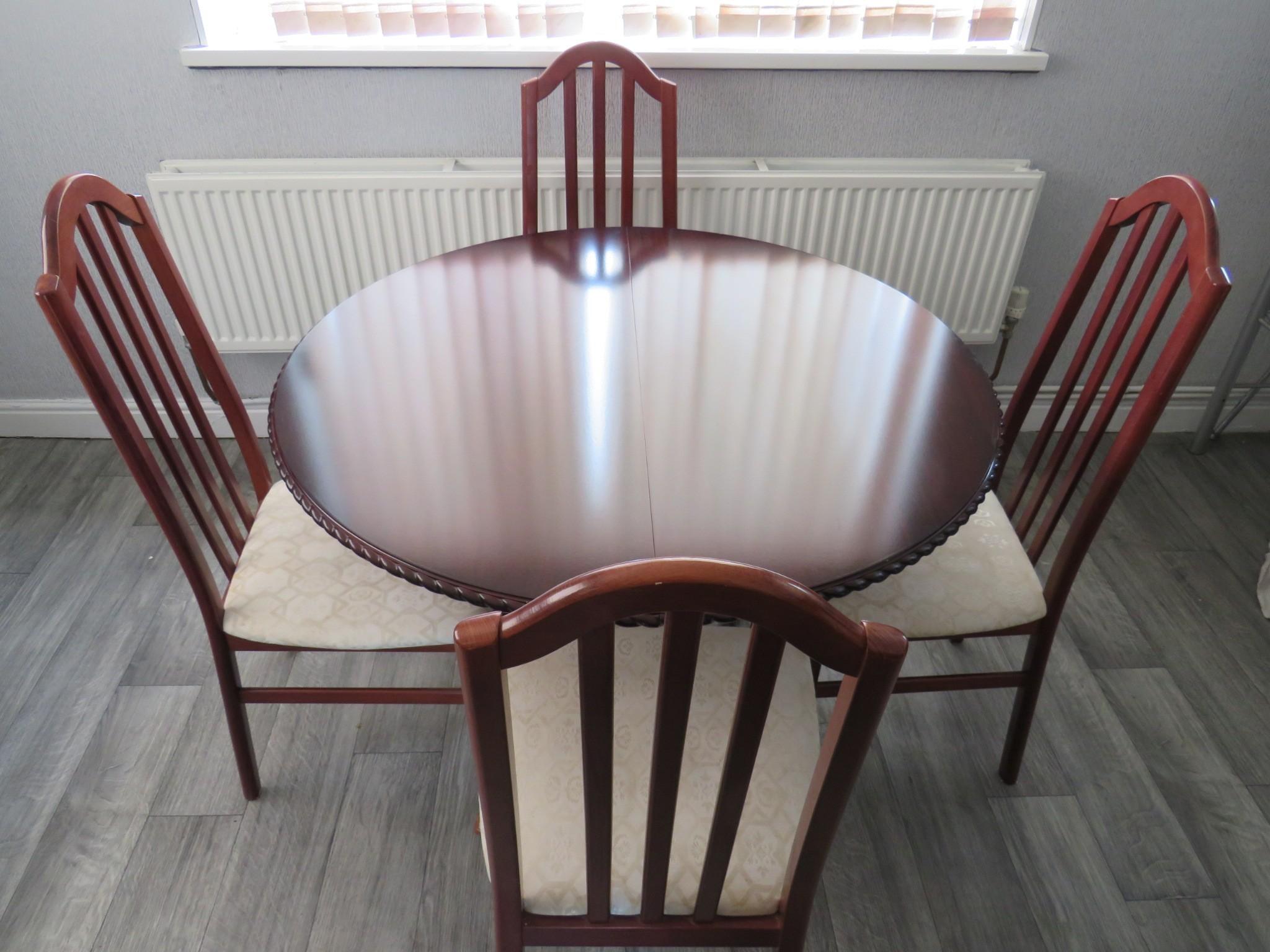 Solid Wood Extendable Dining Table and Chairs in Doncaster for £100.00