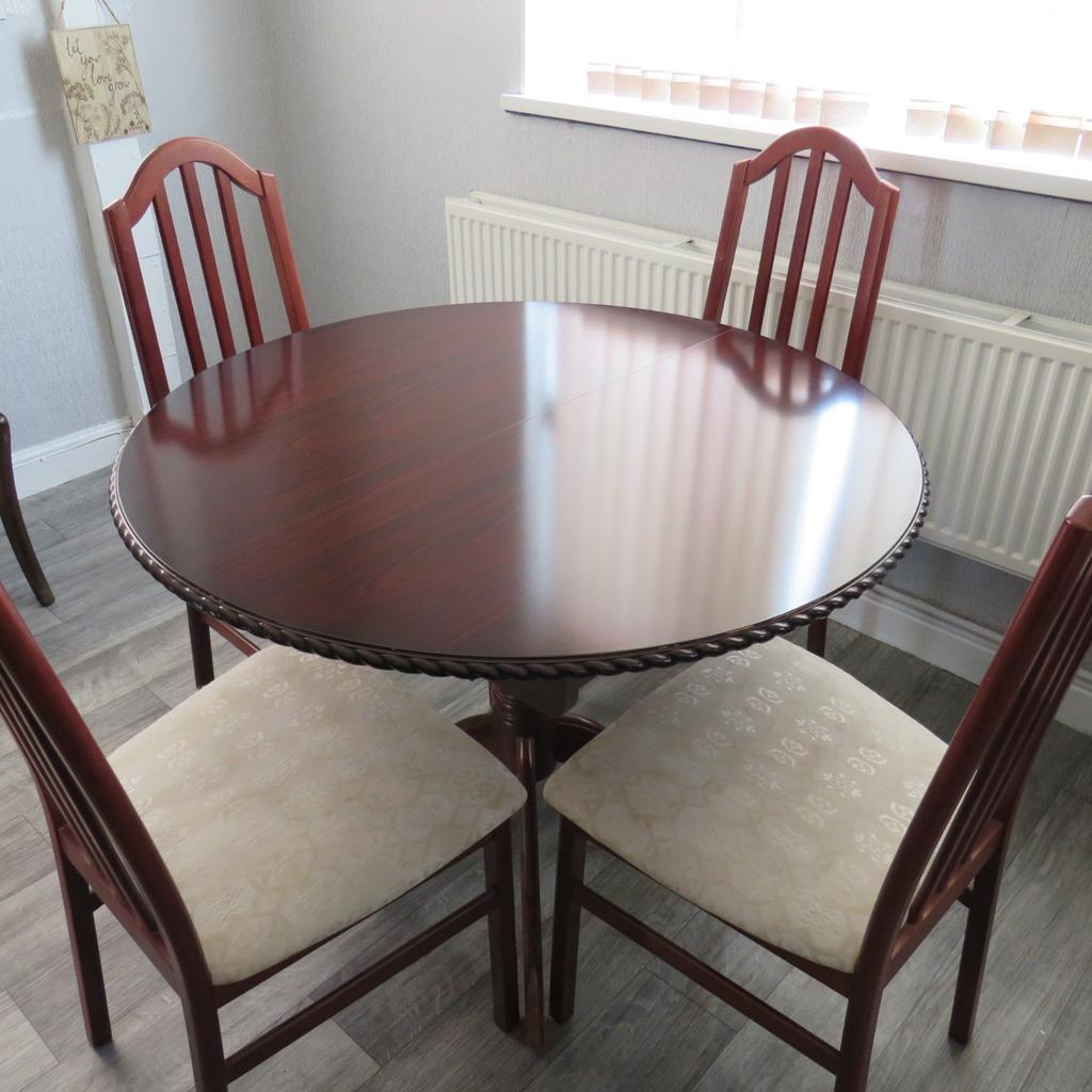 Solid Wood Extendable Dining Table and Chairs in Doncaster for £100.00