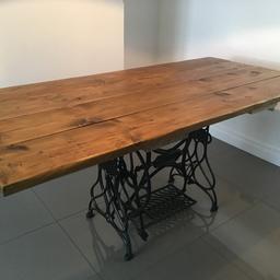 Bespoke rustic Dining table with cast iron industrial sewing machine base, up cycled timber top finished off with beeswax for that aged country look..
Seats 6 comfortably. Read less