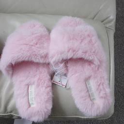Pink slippers unused.
