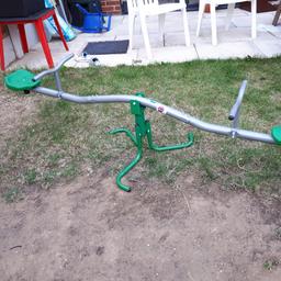 This has been kept indoors as its too small for my boys. Suitable for ages upto 5 I would think. Does see saw (up and down) and merry go round (full 360) round spin. Rrp £40