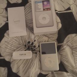 iPod Classic 160GB Silver. In good condition - has some scratches on the back but doesn’t affect use. Works fine. Comes with iPod, box, manuals and little stand - sorry don’t have the cable anymore.