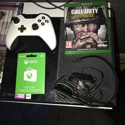 Good condition, comes with a chat mic, £25 gift voucher, and 1 game WW2.