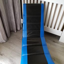 Good condition rocking gaming chair. Folds away for easy storage.