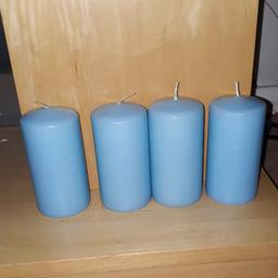 Four light blue pillar candles. £1.50 EACH