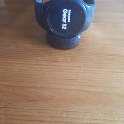 Excellent condition no scratches on watch at all. Can be seen working. Comes with dock and charging cable does not come with box. Will be restored to factory settings. Size large sports strap on watch.