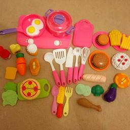 Plastic velcro play food that you can cut up and cooker that lights up and makes noises. Comes in zip up bag with handle. £5. Collection Forest Road, Burton.