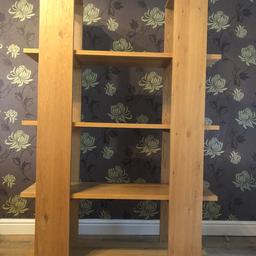 Solid oak shelving unit with 4 shelves 
180cm tall 
120cm wide
40cm Deep
On the second shelf there is a sight mark (seen in picture 2) 
Cost £400 when new
Selling for £40