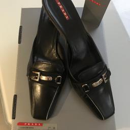 ***REDUCED TO £70 ***Excellent condition black leather Prada kitten heels with original box & dust bag.