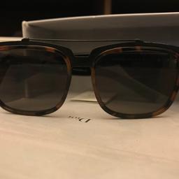 Genuine Christian Dior Sunglasses, purchased from Harrods. Comes with case and pouch. 
Tortoiseshell and black matte metal frame , plastic arm.