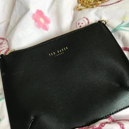 • Genuine Ted Baker 🌸
•Excellent condition 💎👌🏼
•Colour: Black 🖤
•Used once or twice
•Comes with a gold chain can be clipped on and off so can be used as a bag 👜 or a clutch 👝
• Comes in the dust bag
• Can post or be picked up