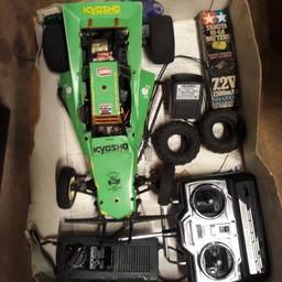 1980s tamiya grasshopper.  Missing battery tray but cheap on ebay. Comes with battery.  Fast and slow charger. All period radio gear.