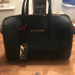 Black and Red Valentino Bag
Used a handful of times, looks like new