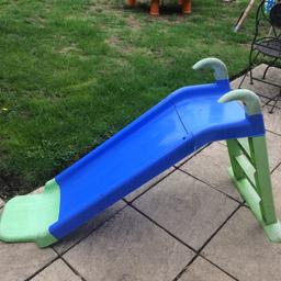 Green and blue plastic slide. Only 2 steps , perfect for toddlers.