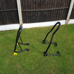 Front and back paddock stands.

Fitted with rear swing arm cups and front fork holders as per the photos.

In good used condition and work well.

Purchased recently 2nd hand from on here to do a one off job.

Painted black by previous owner. Stored in a warm and dry garage.

Collection only from New Whittington, just off Brearley Avenue, Chesterfield, S43