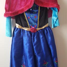 Very good condition, the dress has a detachable shawl.