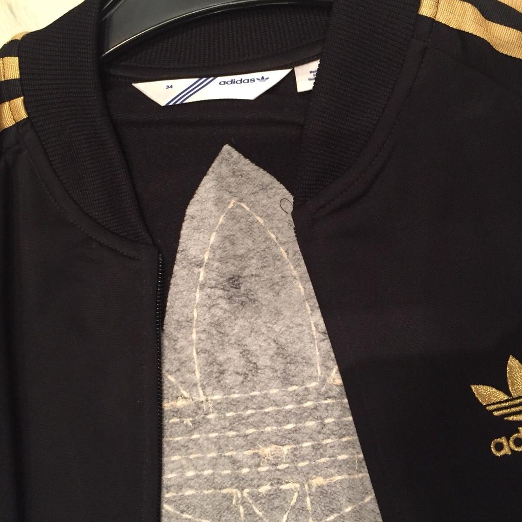 Adidas trainingsanzug cheap schwarz gold