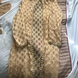 Gold with pearls
Size medium/large