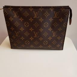 Genuine Louis vuitton toiletry pouch 26, used but in great condition. Please see pictures for wear, no dust bag. Any questions please ask x