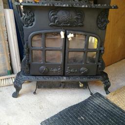 Esse dragon wood burning stove. Good condition. Recently resprayed. Will need new fire rope for doors.10kw great burner with antique look