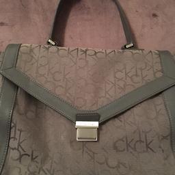 100% genuine Calvin Klein designer handbag, grey monogram , silver protective feet, come with detachable strap, good condition, no marks, no scratch, no hole, possibility for minor mark inside linings but not effect the quality of handbag