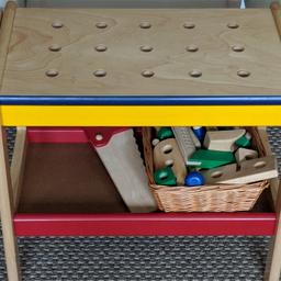 Sturdy wooden workbench in good condition. 

Wooden workbench consists of numerous play pieces including a clamp, hammer, saw, spanner, set square, nuts + bolts. Young builders will be able to learn the basic concepts of tools and how they work. A great way to improve hand/eye co-ordination, motor skills and develop creative and imaginative role play sessions.