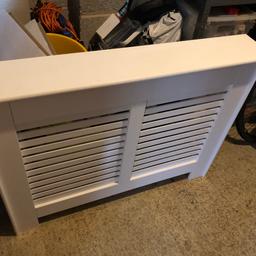 Radiator cover - painted white MDF. 

Bought from B&Q about 12 months ago.  Good condition.

Approximate size;
- 200mm deep
- 910mm tall
- 1090mm wide