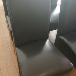 6 Brown bonded leather scroll back dining chairs, with oak colour wooden legs.

A few small dents on a couple of them as shown in photos.

Leather has blistered and peeled slightly on one, also shown in photo.

Other than the above, in good condition, nice comfy chairs. 

Collection only please 

Advertised elsewhere