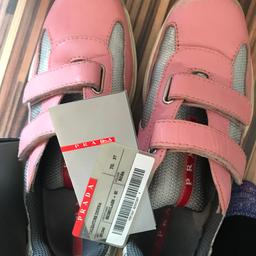 Pink pradas few scuffs at the front yu can get pink polish to cover 

The sued needs cleaning too comes up lovely with sued cleaner