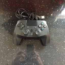 Black PS4 controller leaded