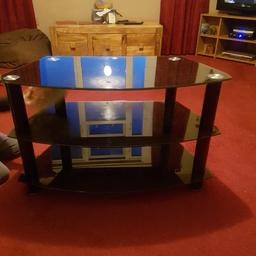 black glass t.v. Stand in good condition