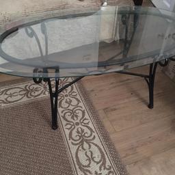 Solid glass table heavy metal bottom