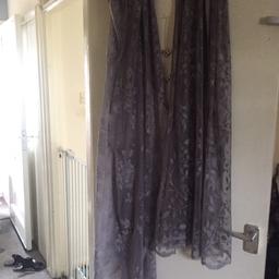 One full drop great grey lace curtain
The other good for a window
Both immaculate condition 
Still selling in wilko 
Collection only