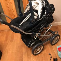 Excellent condition comes with parasol, raincover, car seat and pram bag