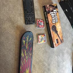 This bundle includes a Bluetooth keypad, tony hawk skate board (no game unfortunately) and a guitar hero guitar and two games.
Collection only
