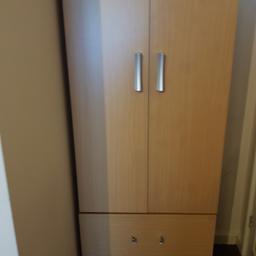 oak wardrobe. In good condition only bottom handle is broken. collection only and clothes not included