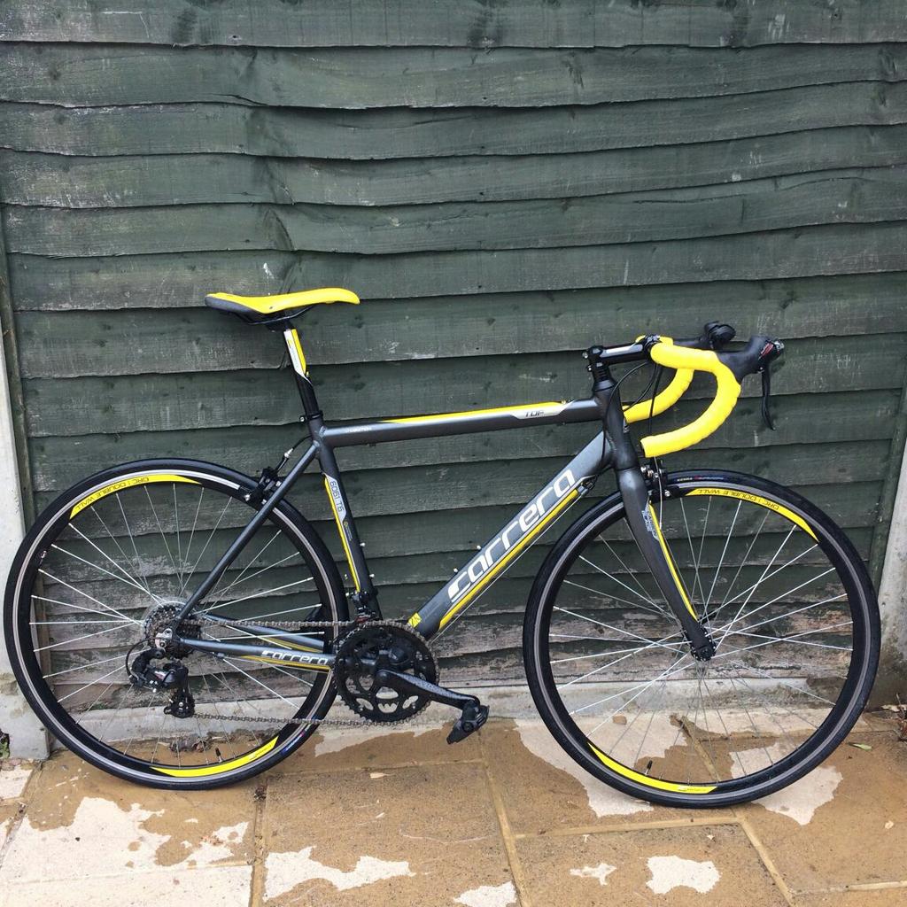 Yellow and black shop carrera road bike