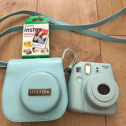 Blue instax 8 mini instant camera, it comes with genuine matching case & one pack of films.