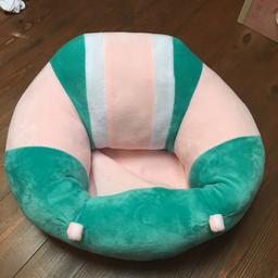 It’s a bumbo type chair - put legs through but is soft cushion type chair