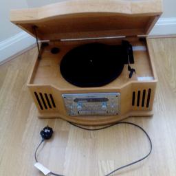 Bush record player with radio and CD player. Record player and radio okay, but CD player does not work. Otherwise in good condition. Collection only from Rochester ME1.